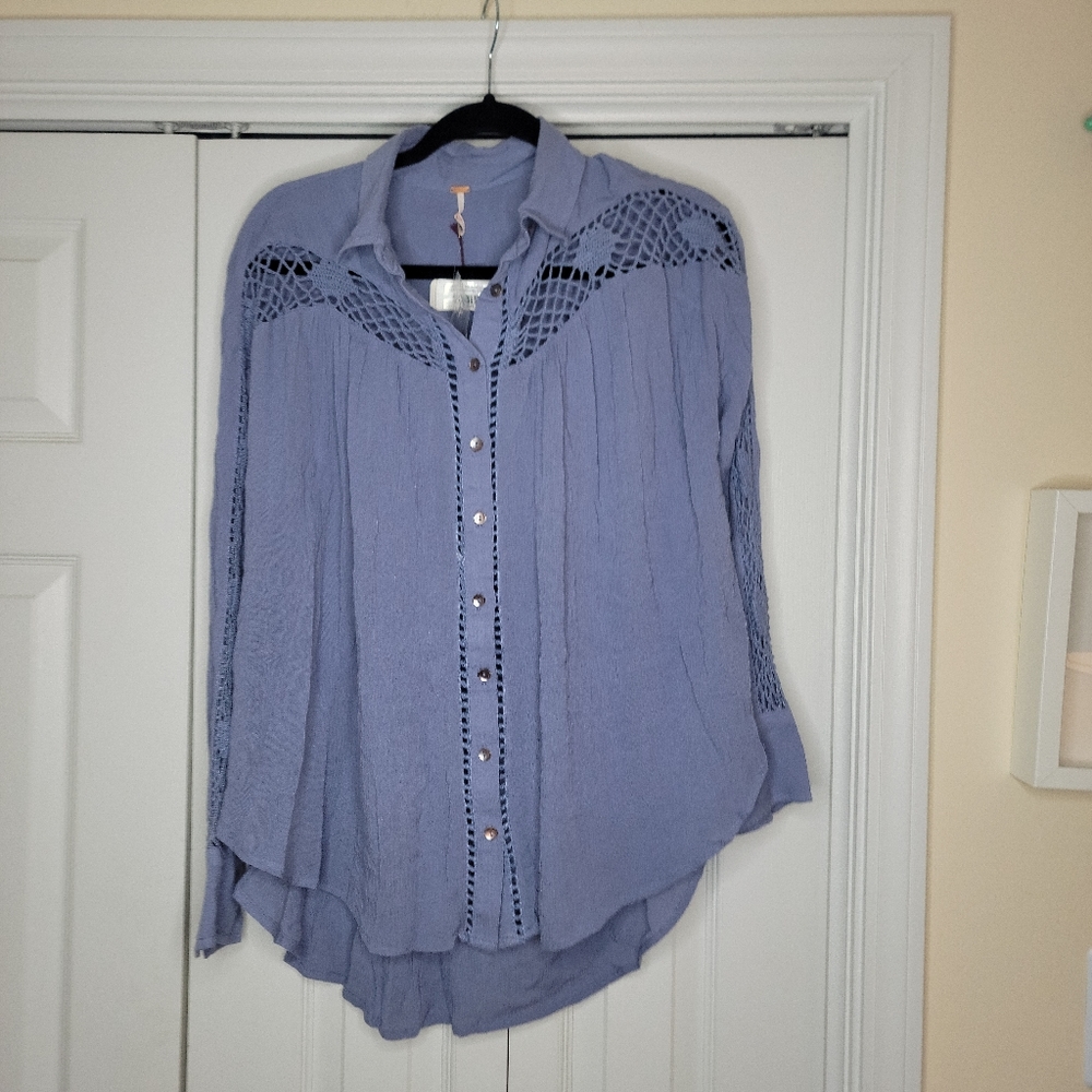 Free People button down women shirt. Size XS with crochet details.  Brand new.